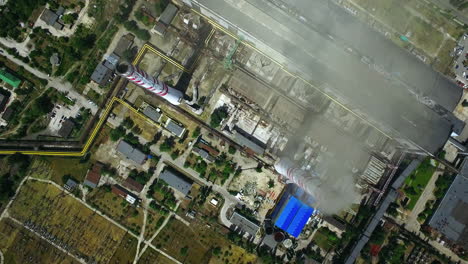 heavy industry plant with manufacturing buildings. aerial view of power plant