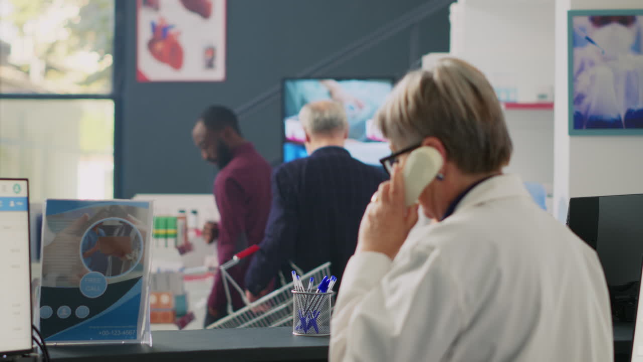 People at a pharmacy counter with a prescription