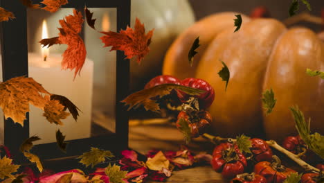 digital composite video of autumn leaves moving against halloween celebration in background