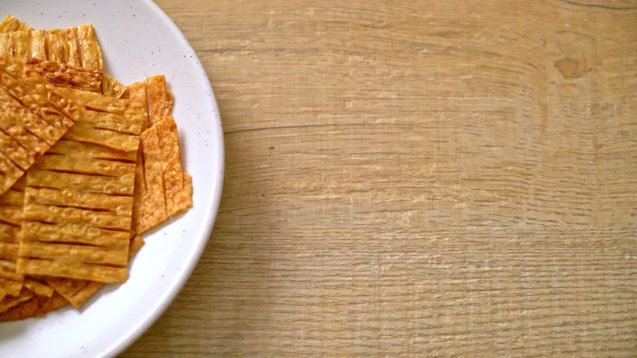 Snack de mariscos de calamar en placa