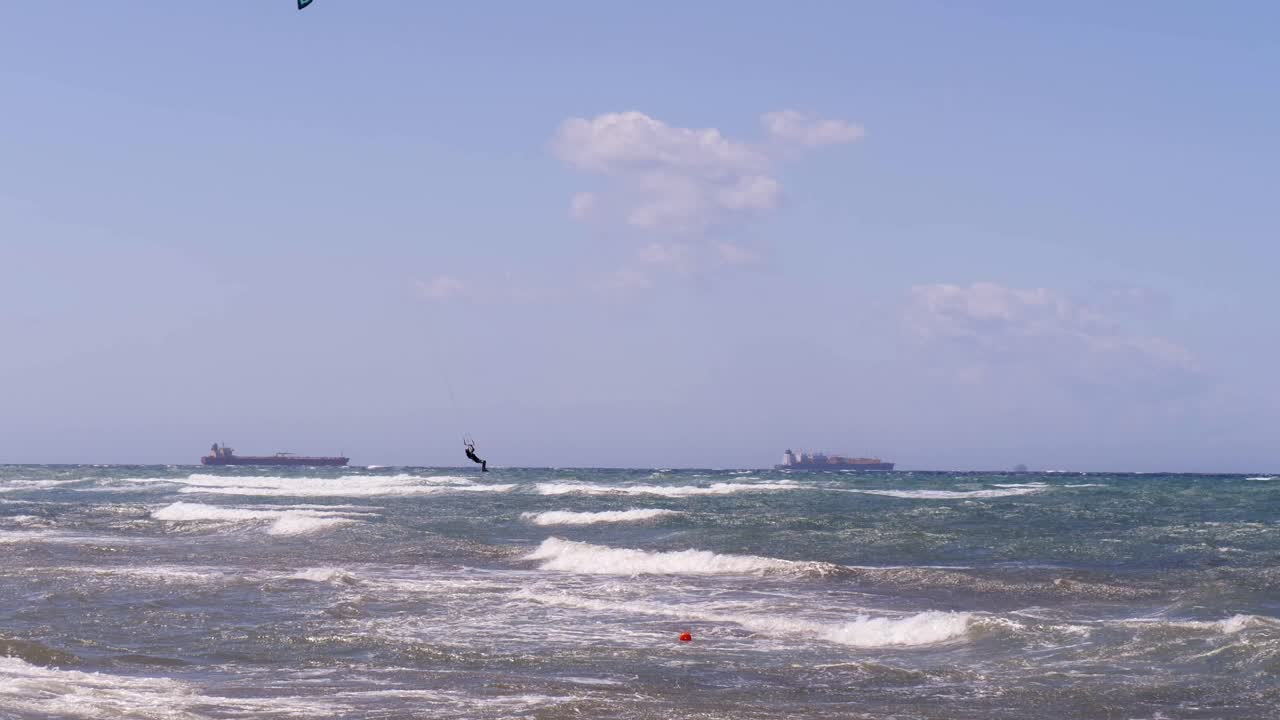 High Jump of a Kitesurf in slow motion During a Windy Day in slow motion