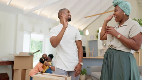 Moving,-boxes-and-couple-high-five-with-black