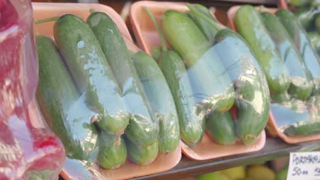 cucumbers on display at a market