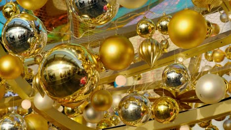 golden christmas ball swinging