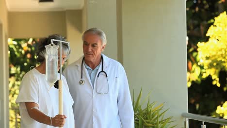 doctor and patient walking in the deck