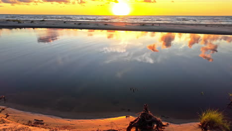 Sunset-sun-reflexion-at-Baltic-Sea,-new-day-start,-beautiful-calm-landscape