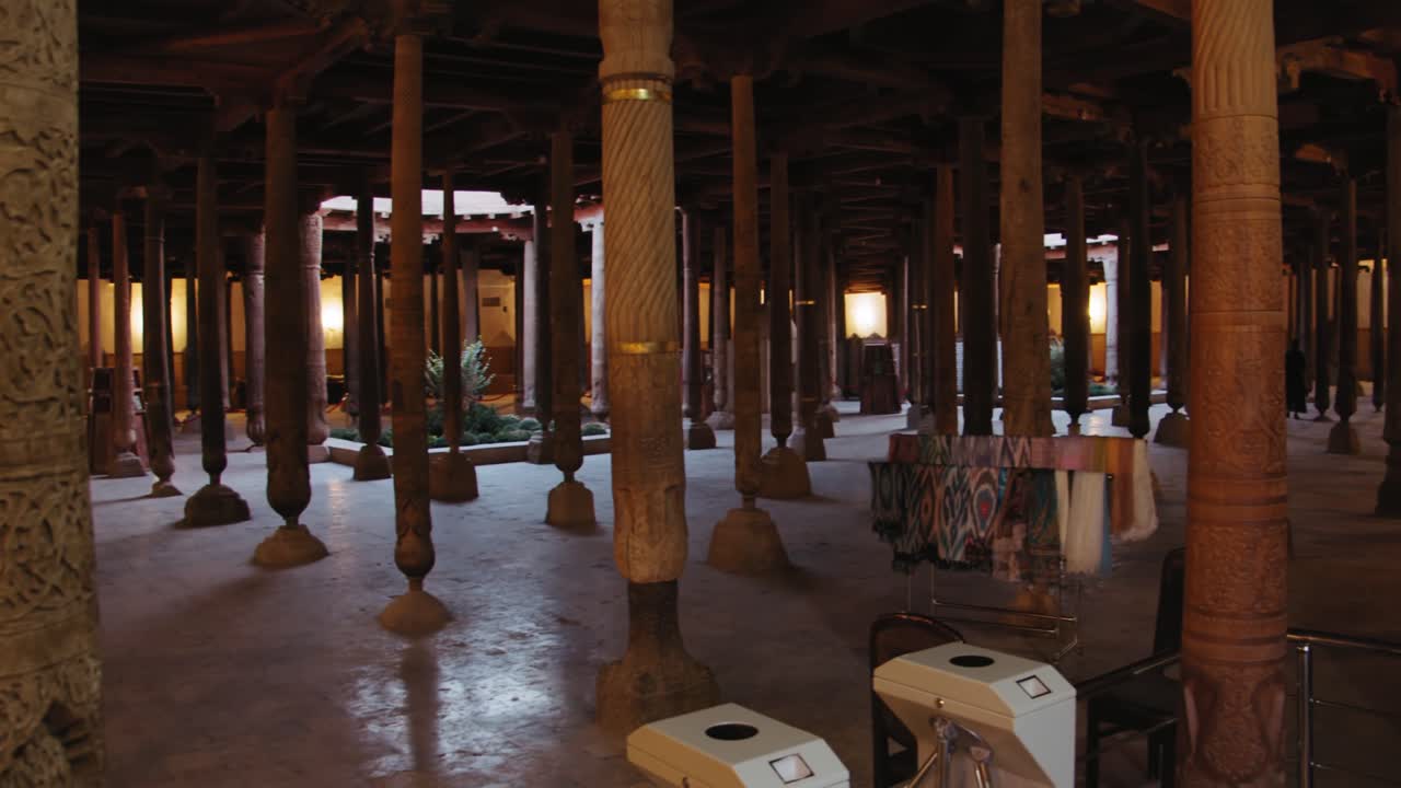 Interior of a Historical Building with Wooden Pillars