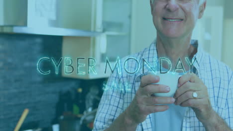 Holding-cup,-man-smiling-with-Cyber-Monday-Sale-text-animation-in-kitchen-background