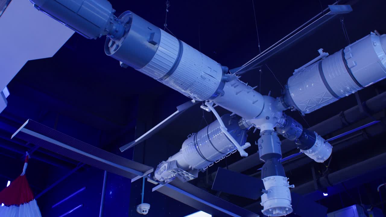 Chinese Space station model under blue light in Xichang, China