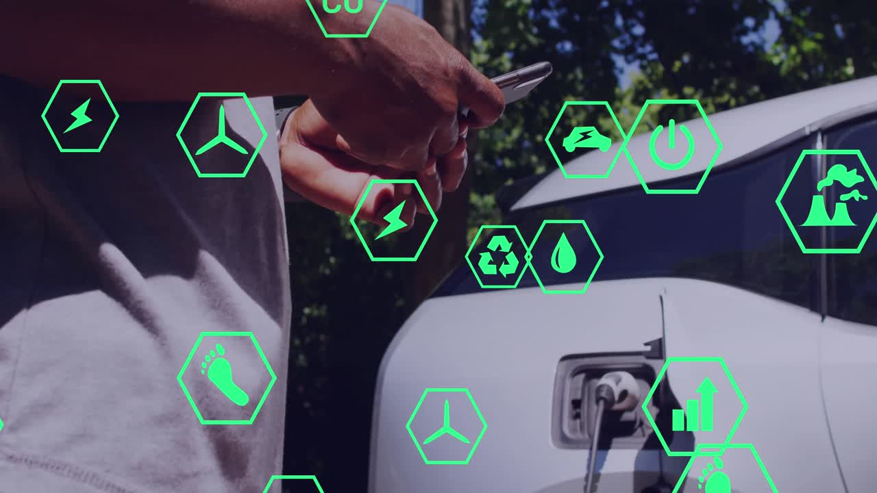 animación de iconos de ecología sobre un hombre afroamericano llenando de combustible un coche y usando un teléfono inteligente.