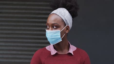 african american wearing face mask in street