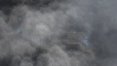 4k background, thick clouds in the sky and thunderstorms