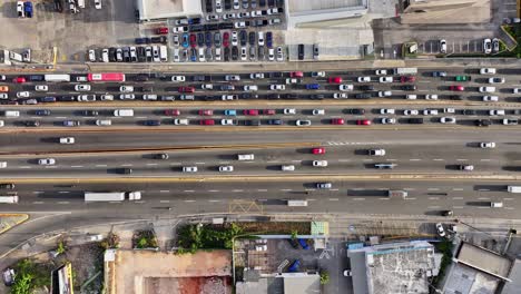 aerial top down traffic jam in one way and flowing lane other side