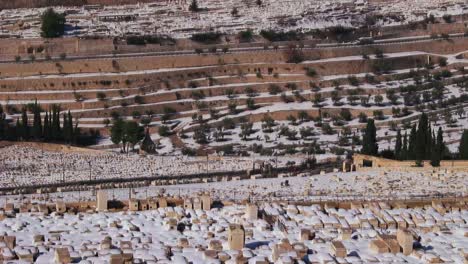 tilt up to a wide view overlooking jerusalem and the temple mount following an unusual snowfall 1