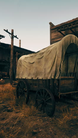 a covered wagon in a western town