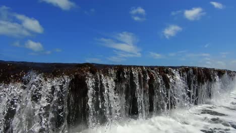 beautiful natural waterfall in the ocean created low tide in the small beach town of sibauma near pipa in rio grande do norte, brazil