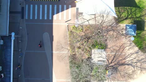 Office-worker-on-his-daily-bicycle-commute-to-work,-riding-through-Sydney-outskirts