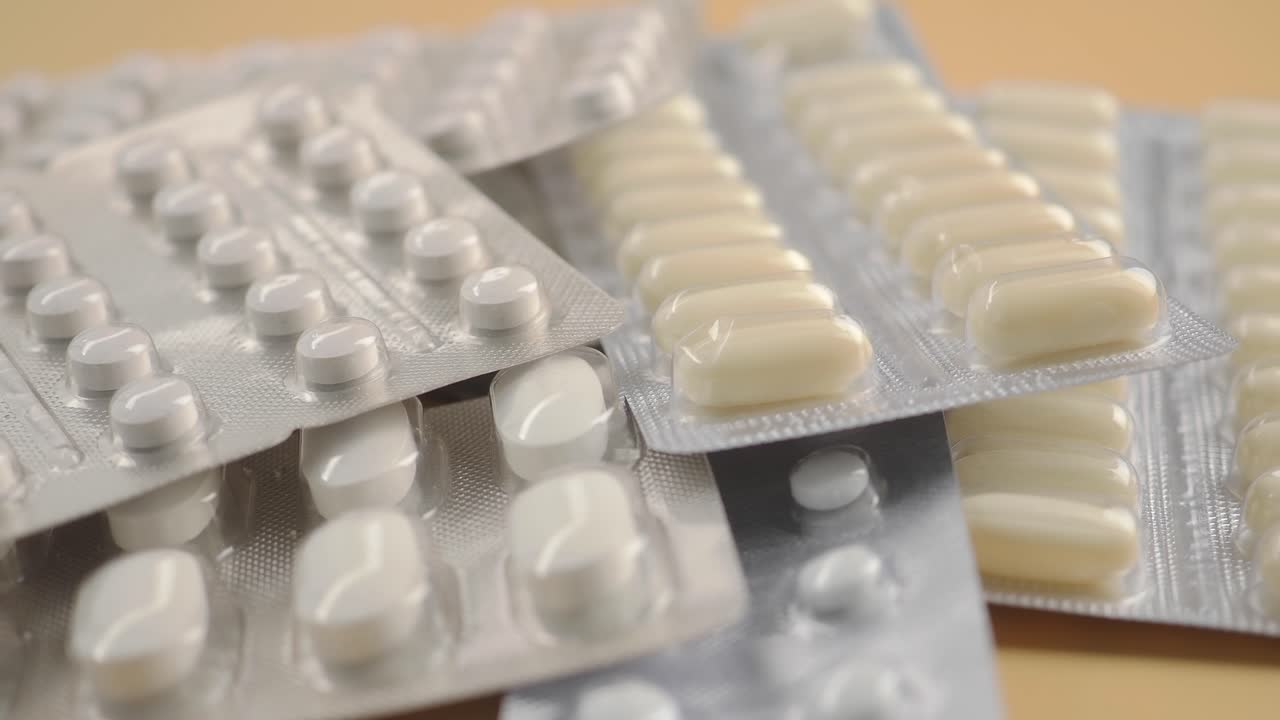 Close-Up of Various Pills and Capsules in Blister Packs