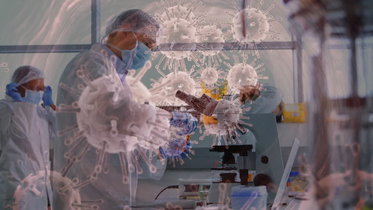 실험실에서 얼굴 마스크를 착용한 사람들에게 코로나바이러스 세포의 애니메이션