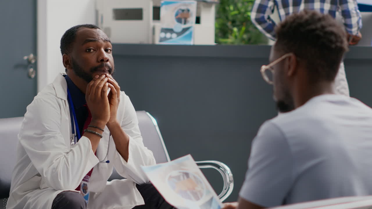 Stressed general practitioner sitting in waiting area lobby