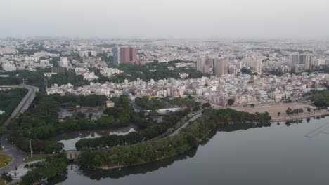 Aerial-footage-of-the-Hyderabad,-Khairatabad-flyover-area-near-the-Indira-Priyadarshini-Gandhi-Statue-the-capital-and-largest-city-of-the-Indian-state-of-Telangana