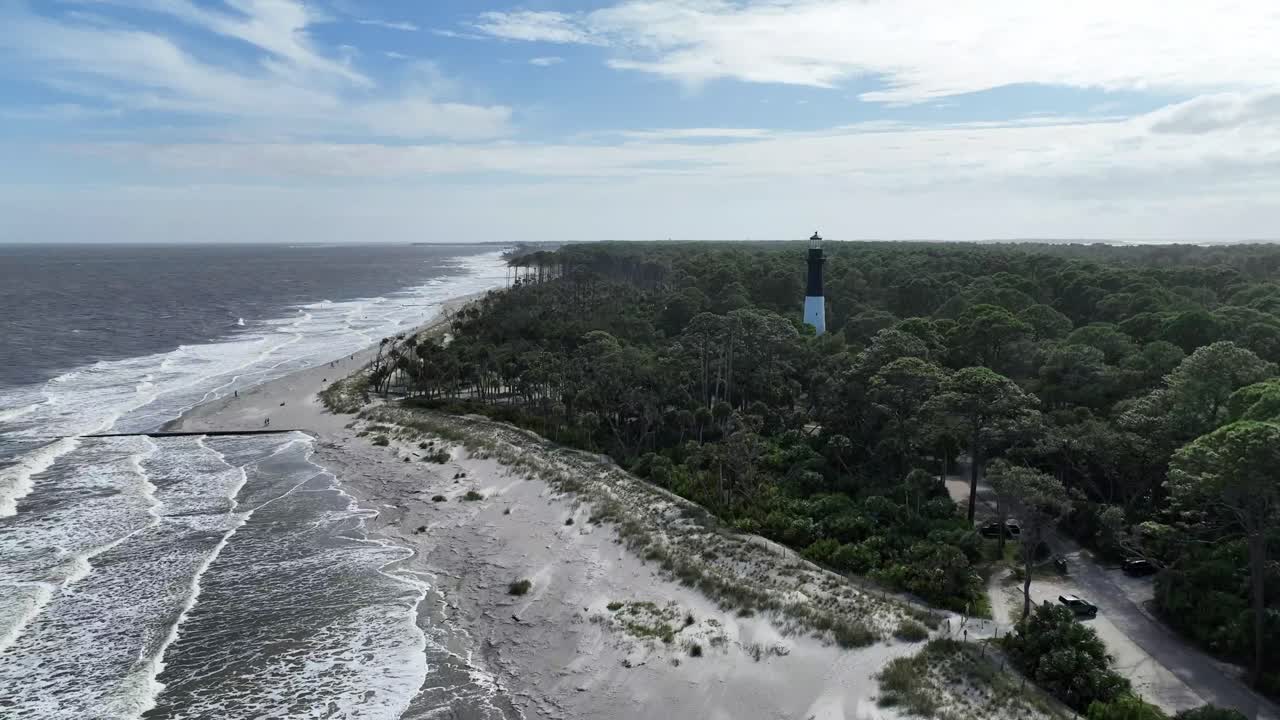 Aerial View of a Lighthouse on a Sandy Beach