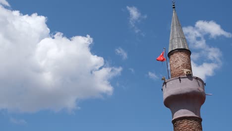 minaret and clouds, clouds and sky behind mosque minaret