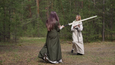 teenagers from middle ages play with swords