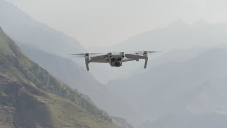 drone flying over mountainous landscape