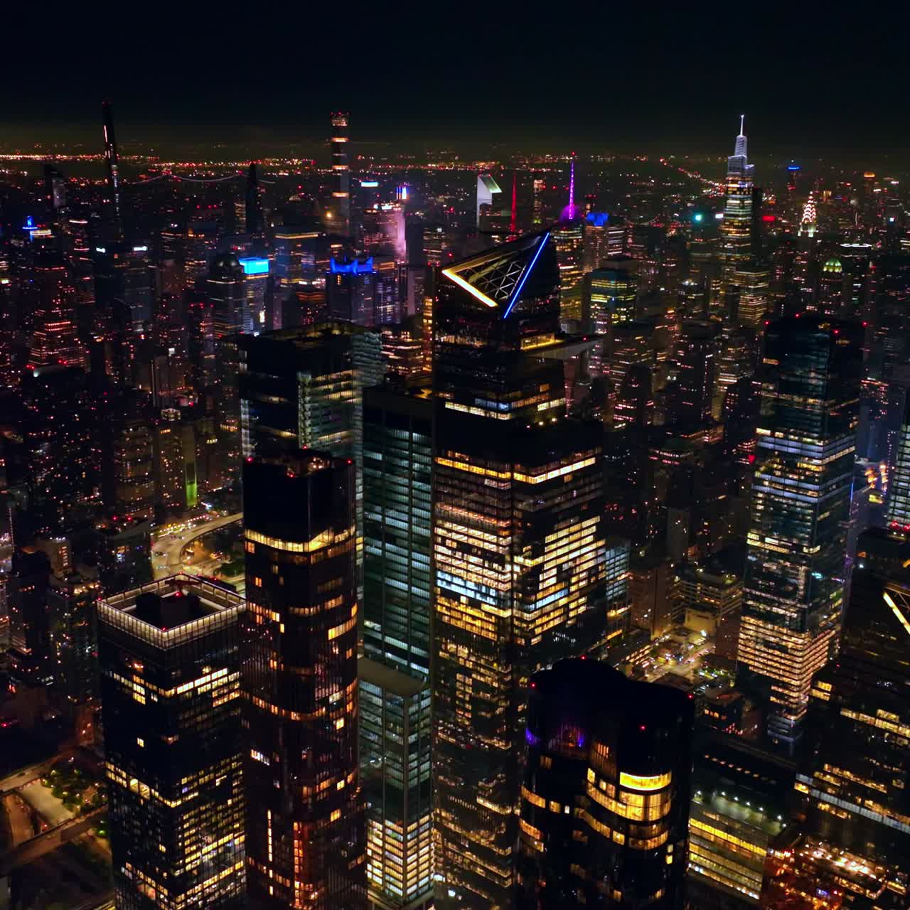 Breath-taking view of scenic New York at night. Drone footage over the endless panorama of never sleeping metropolis