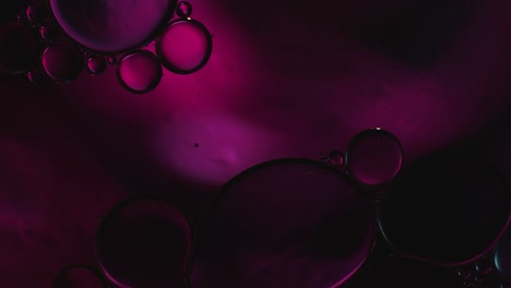 abstract colorful food oil drops bubbles and spheres flowing