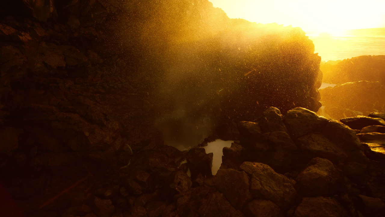 Golden Hour Waves Crashing on Volcanic Coastline