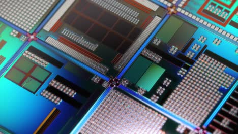 Silicon-semiconductor-wafer-close-up.-In-electronics,-a-wafer-also-called-a-slice-or-substrate-is-a-thin-slice-of-semiconductor,-a-crystalline-silicon,-used-for-the-fabrication-of-integrated-circuits