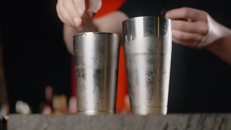 Bartender Preparing Cocktails with Cocktail Shaker