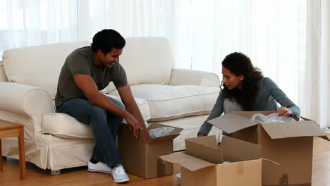 couple moving their stuff