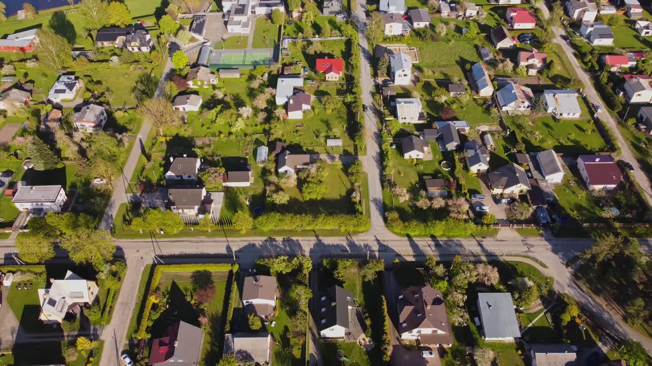 A sunny day in Katlakalns Spring Residential Area, showcasing the peaceful neighborhood in Latvia.