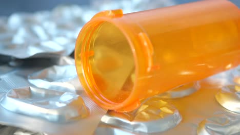 orange pill container with blister packs