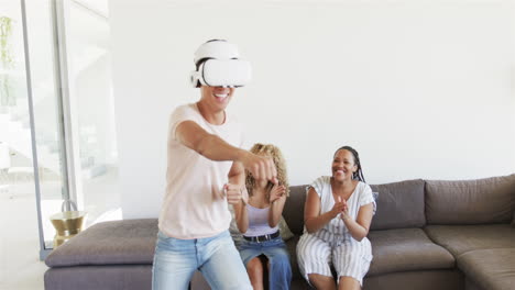 young asian man enjoys virtual reality at home, with copy space