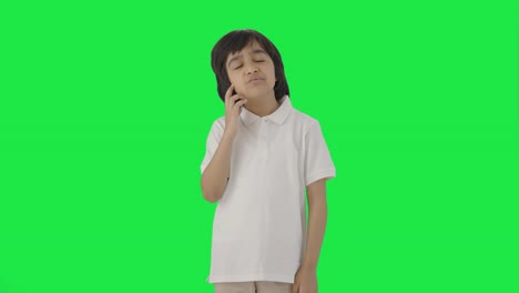 Confused-Indian-boy-thinking-about-something-Green-screen