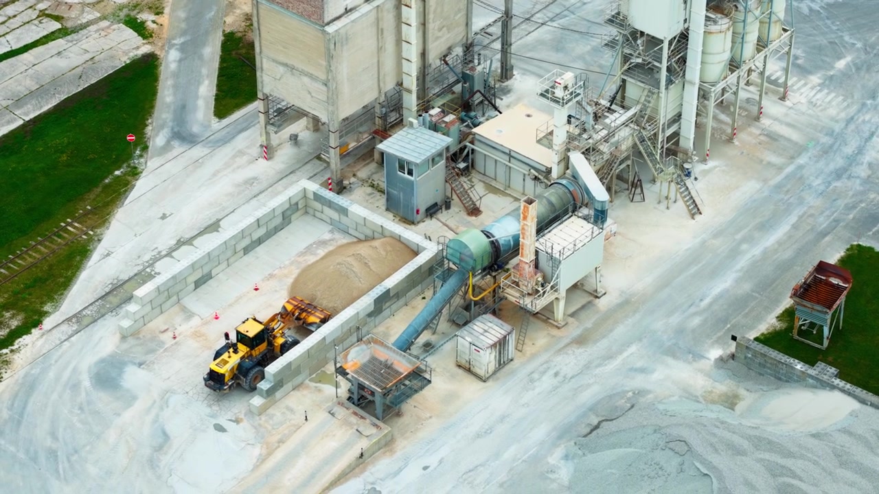 Drone view of asphalt production silos drying system and aggregate storage yard