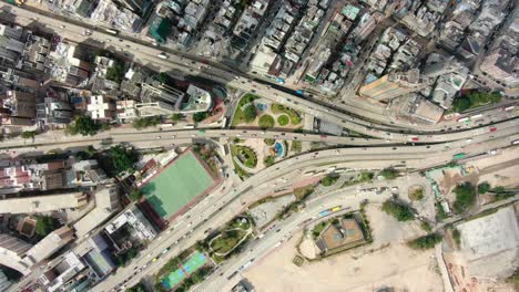 aerial shot of downtown hong kong skyscrapers and traffic, on a beautiful day