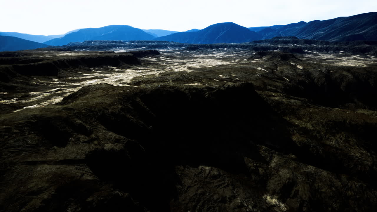 Breathtaking view of mountain landscape with rugged terrain and shadows