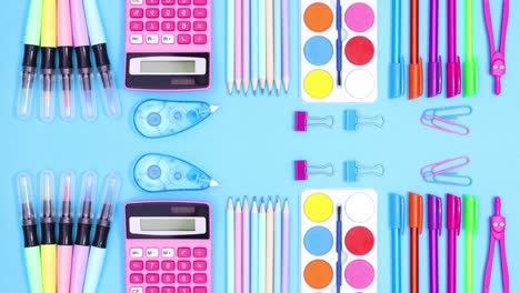 back to school stationery appear on top and bottom of pastel blue theme. stop motion