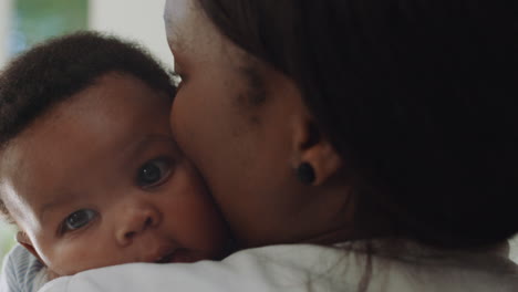 mother holding baby at home calming tired newborn gently soothing restless infant nurturing child loving mom enjoying motherhood