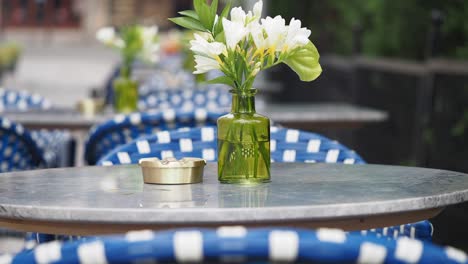 outdoor cafe table with flowers