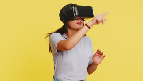 Excited-woman-in-VR-headset-helmet-watching-virtual-reality-3D-video,-playing-simulation-online-game