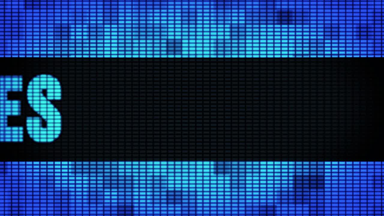 Digital Display Showing Words and Symbols