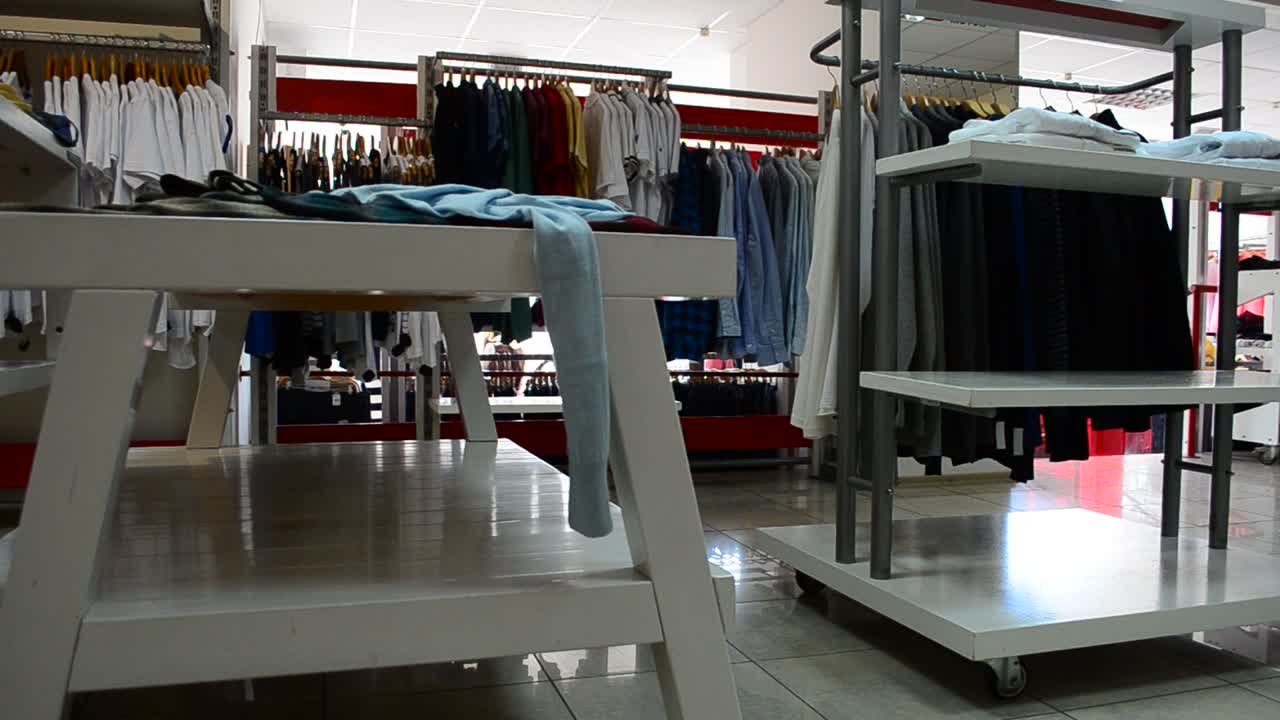 Clothes choice, shop. Racks with clothes