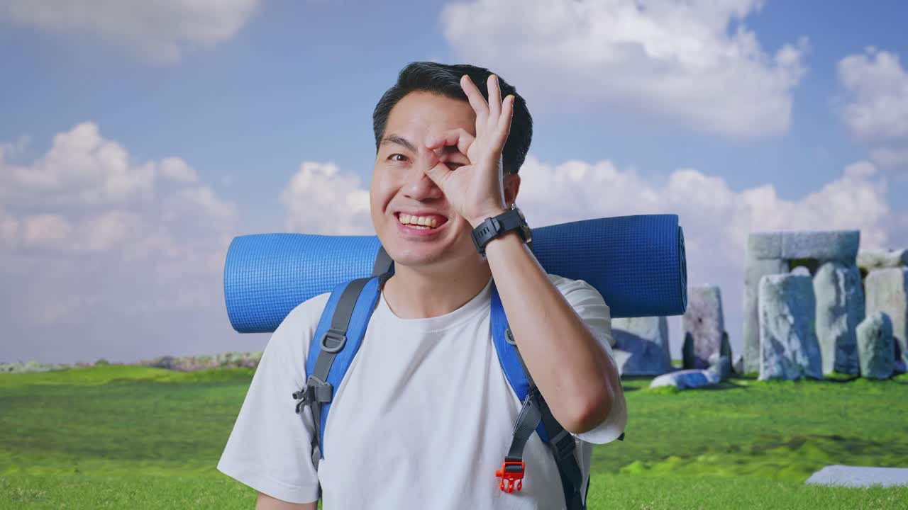 Smiling Traveler with Backpack near Ancient Stones