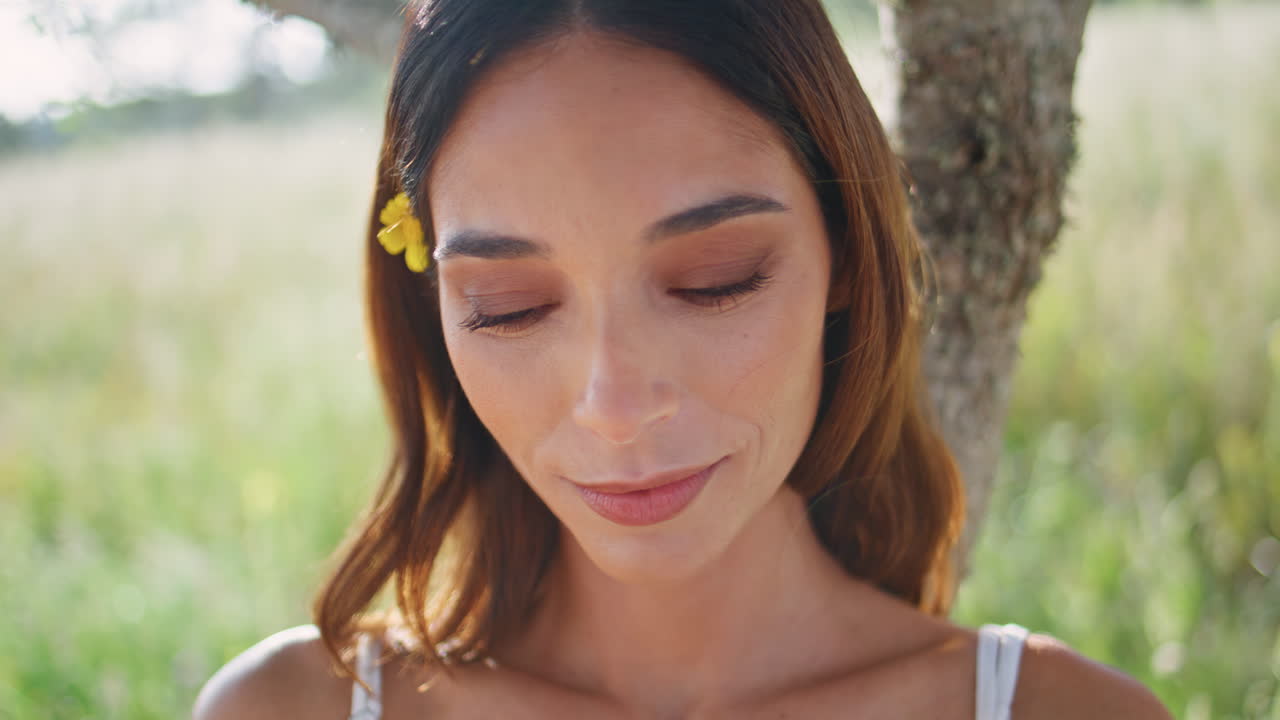 Tender brunette relaxing garden smiling gently portrait. woman posing